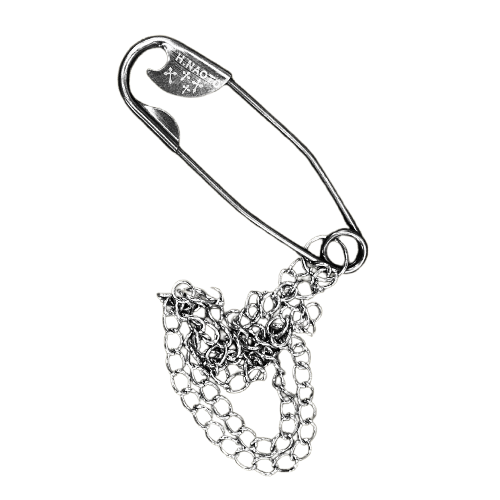 Large safety pin pendant branded with "h.NAOTO" and cross symbolism.